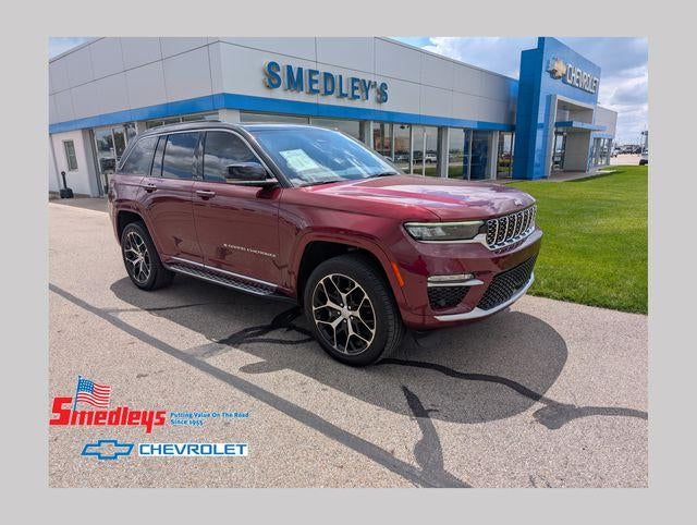 2024 Jeep Grand Cherokee Summit Reserve in Red — front three-quarter view