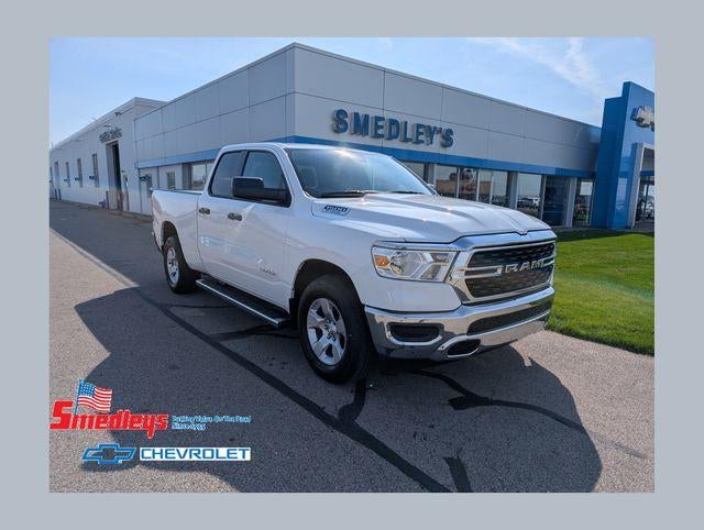 2023 RAM 1500 Big Horn in White — front three-quarter view