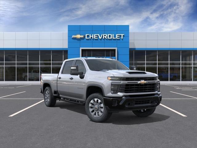2026 Chevrolet Silverado 2500 HD Custom in Sterling Gray Metallic — front three-quarter view
