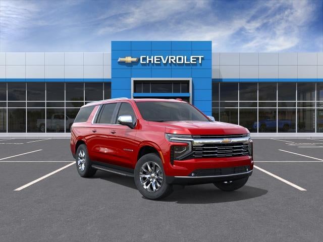 2026 Chevrolet Suburban Premier in Radiant Red Tintcoat — front three-quarter view