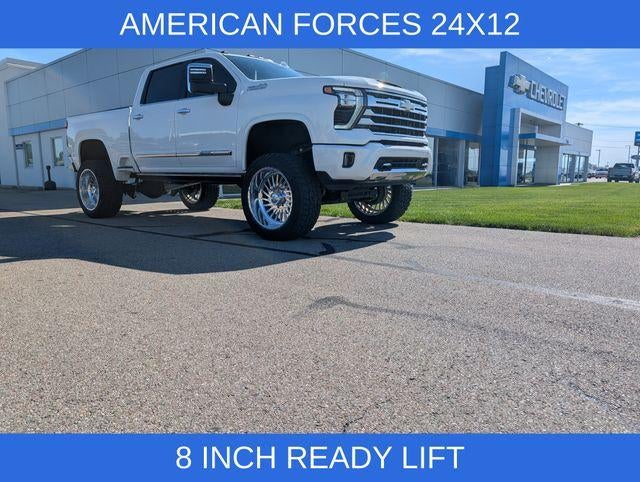 2024 Chevrolet Silverado 2500 HD High Country in Summit White — front three-quarter view