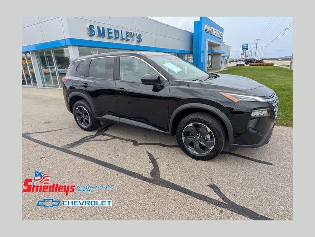 2025 Nissan Rogue SV in Black — front three-quarter view